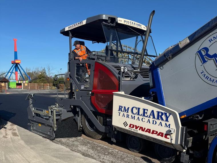 The RM Cleary Dynapac SD2500 paver laying the wearing course on a car park, tipper feeding alongside.
